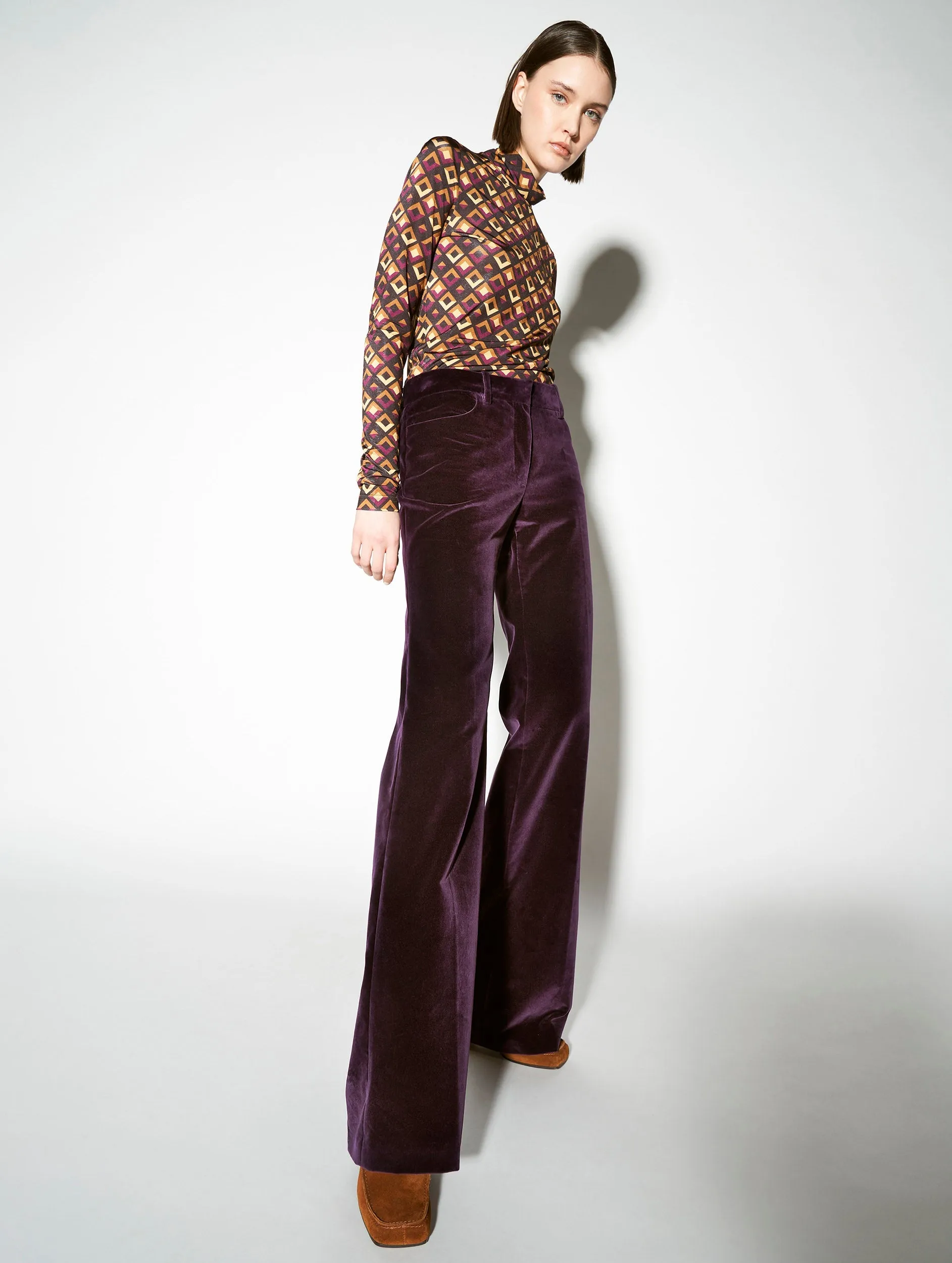 Flared plum velvet trousers