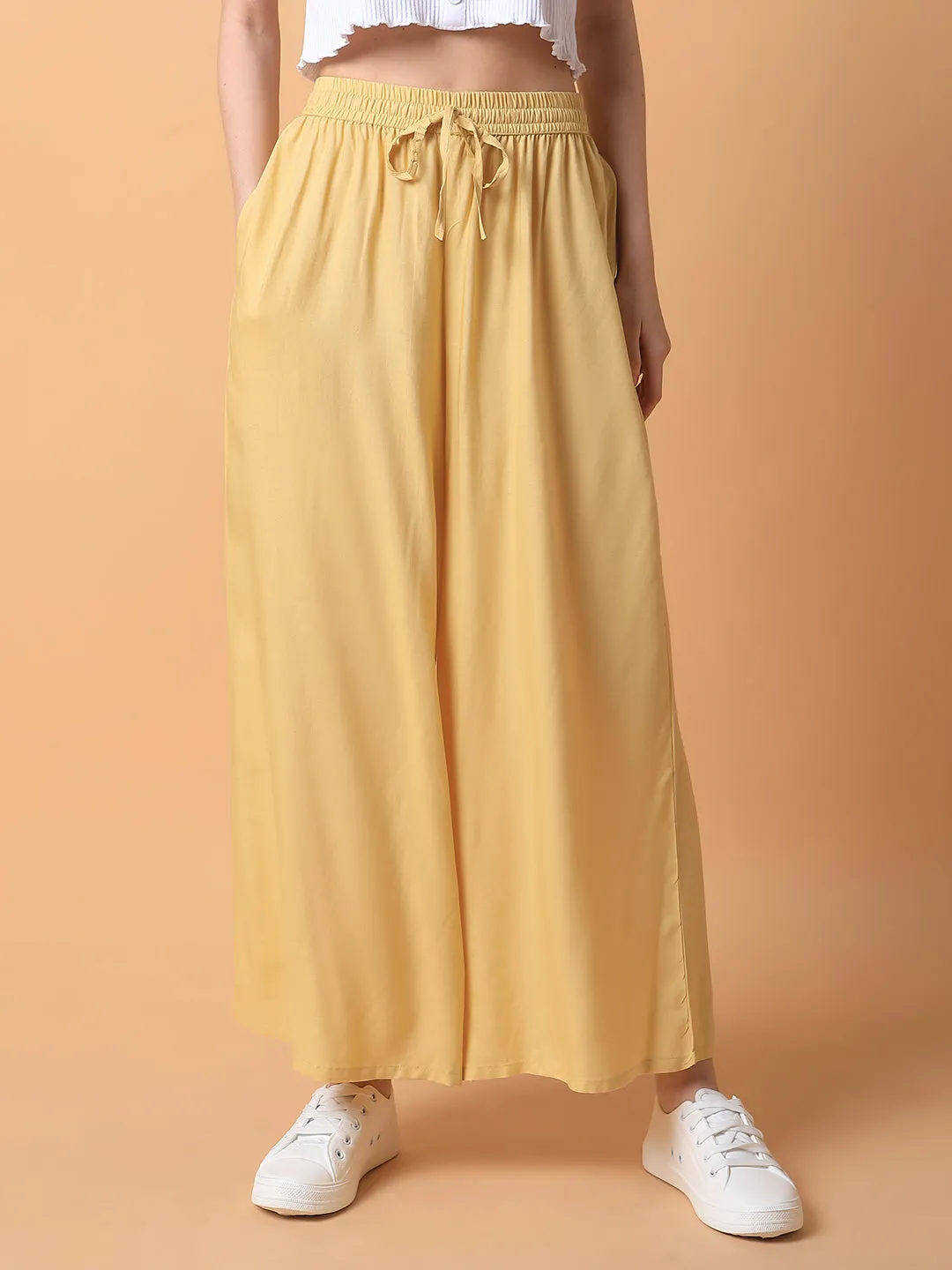 Women Yellow Solid Pleated Loose Fit Trouser